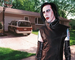 A dejected Marilyn Manson ponders his next move.